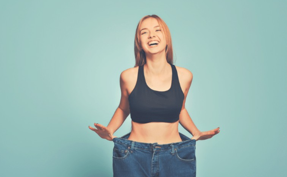A woman showing weight loss